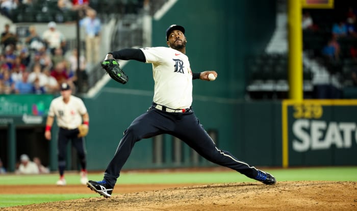 Jul 15, 2023; Arlington, Texas, USA; Texas Rangers relief pitcher Aroldis Chapman (45) throws during the ninth inning against the Cleveland Guardians at Globe Life Field. Mandatory Credit: Kevin Jairaj-USA TODAY Sports